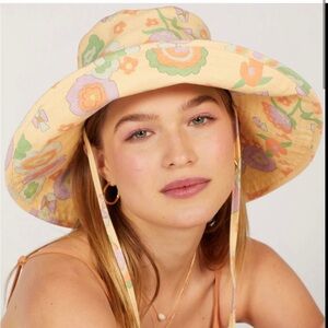 Free people Lack of Color holiday bucket hat it retro floral.
